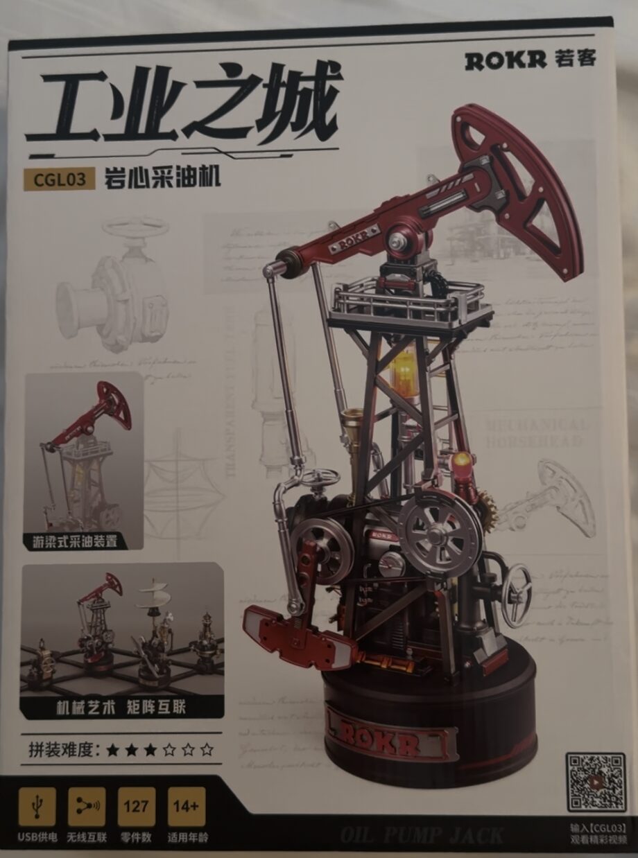 A ROKR model kit box for an oil pump jack, a 127-piece mechanical build with a moving horsehead arm.